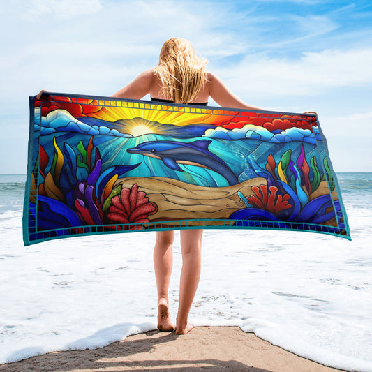 Dancing Tides geometric pattern on a Color in Motion beach towel 30x60 — woman walking on beach with towel flowing behind her