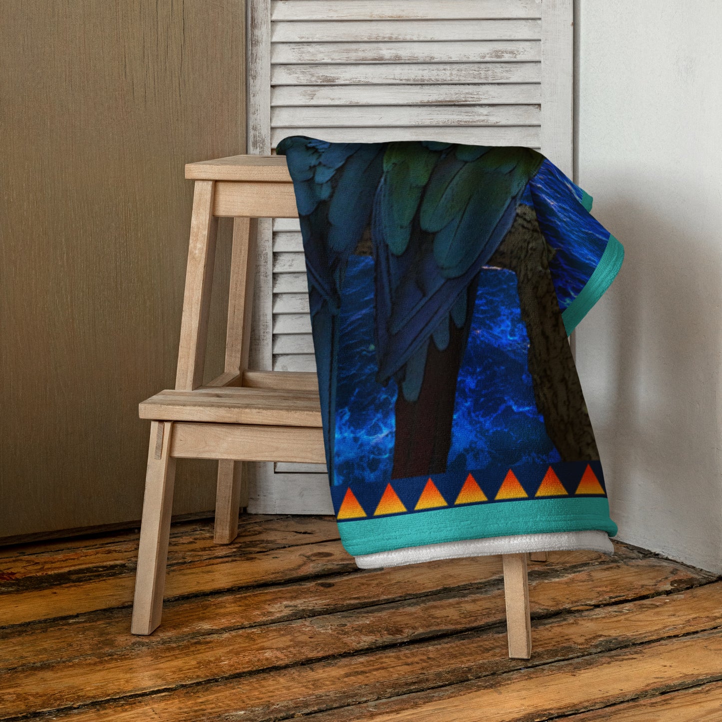 Love Birds geometric pattern on a Color in Motion beach towel 30x60 — folded and draped over wooden stool