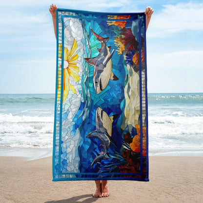 Tide Hunters geometric pattern on a Color in Motion beach towel 30x60 — person on beach holding towel lengthwise