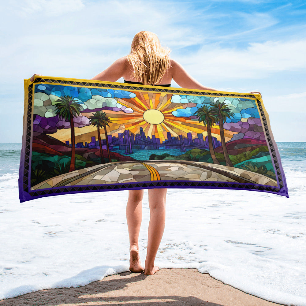 City of Dreams geometric pattern on a Color in Motion beach towel 30x60 — woman walking on beach with towel flowing behind her