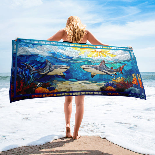 Tide Hunters geometric pattern on a Color in Motion beach towel 30x60 — woman walking on beach with towel flowing behind her