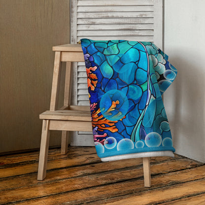 Drift into Light geometric pattern on a Color in Motion beach towel 30x60 — folded and draped over wooden stool
