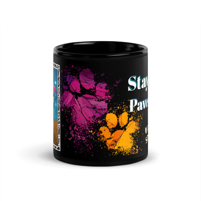 Stay Pawsitive text with image of a Old English Sheepdog dog on stained glass style background with colorful paw prints on a black ceramic mug 11 oz — front view