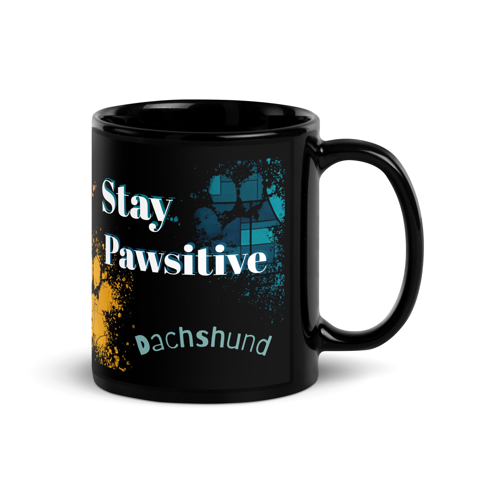 Stay Pawsitive text with image of a Dachshund dog on stained glass style background with colorful paw prints on a black ceramic mug 11 oz — handle on right