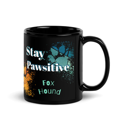 Stay Pawsitive text with image of a Fox Terrier dog on stained glass style background with colorful paw prints on a black ceramic mug 11 oz — handle on right