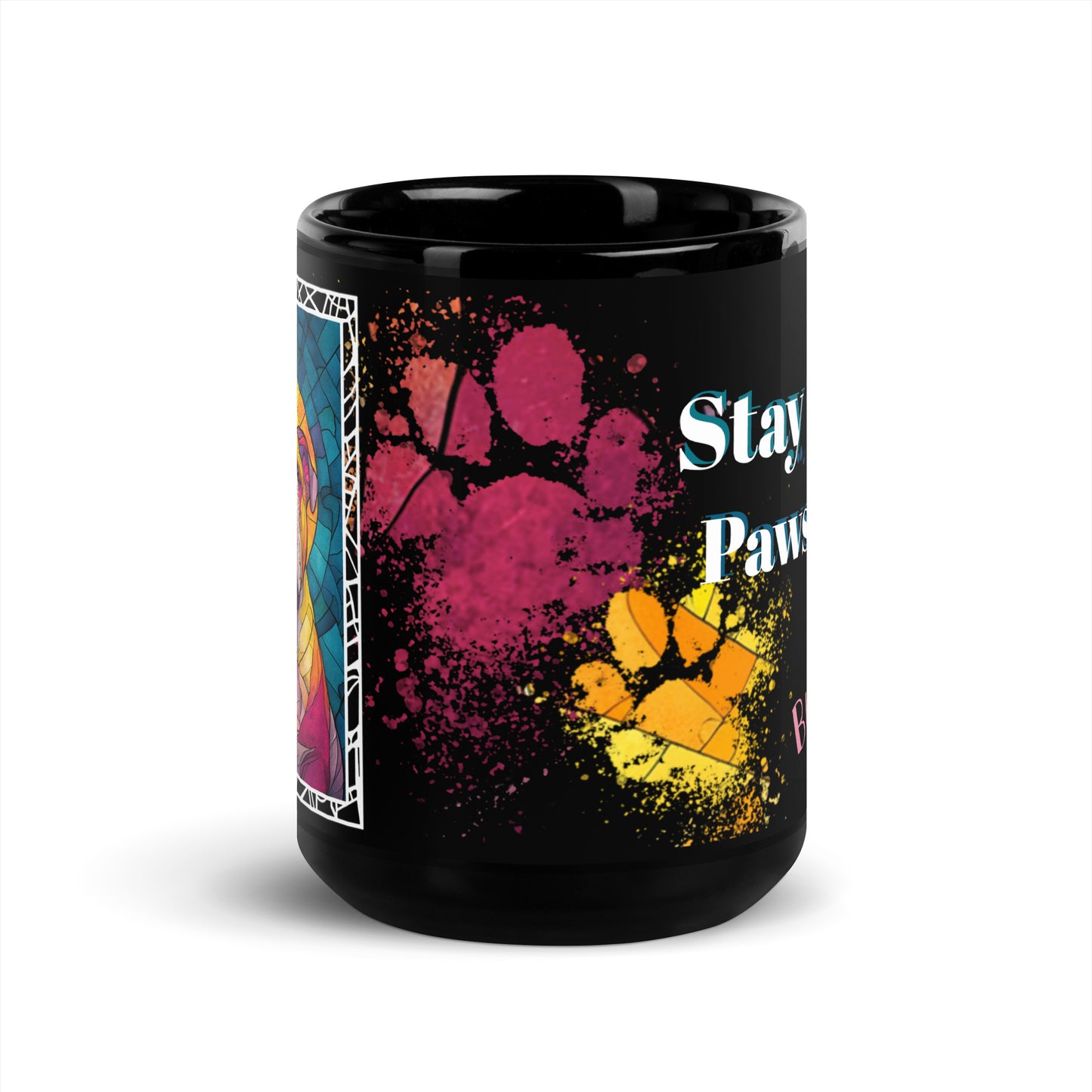 Stay Pawsitive text with image of a Bulldog on stained glass style background with colorful paw prints on a black ceramic mug 15 oz — front view