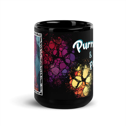 Purrr & Pour text with image of a Bengal cat on stained glass style background with colorful paw prints on a black ceramic mug 15 oz — front view