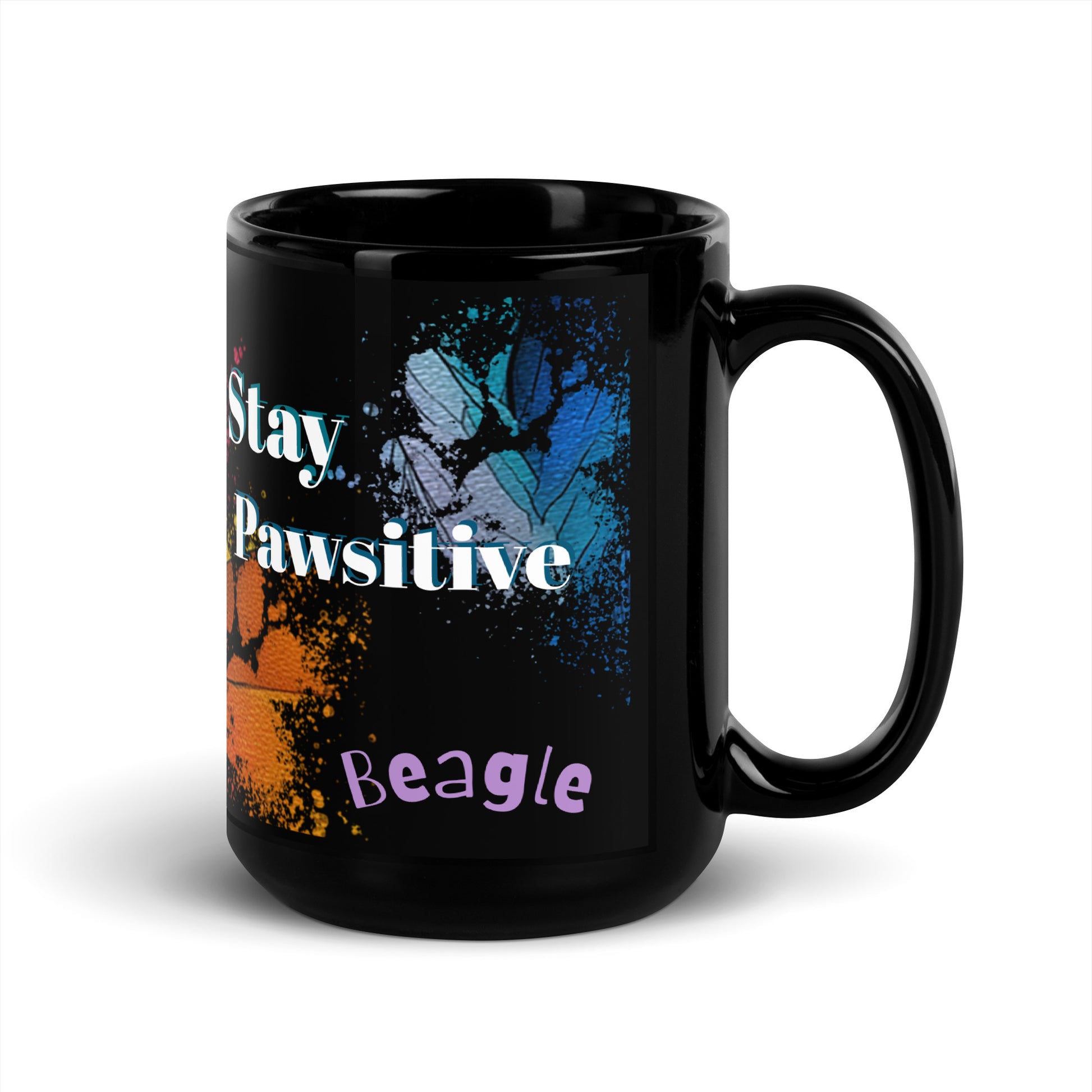 Stay Pawsitive text with image of a Beagle dog on stained glass style background with colorful  paw prints on a black ceramic mug 15 oz — handle on right
