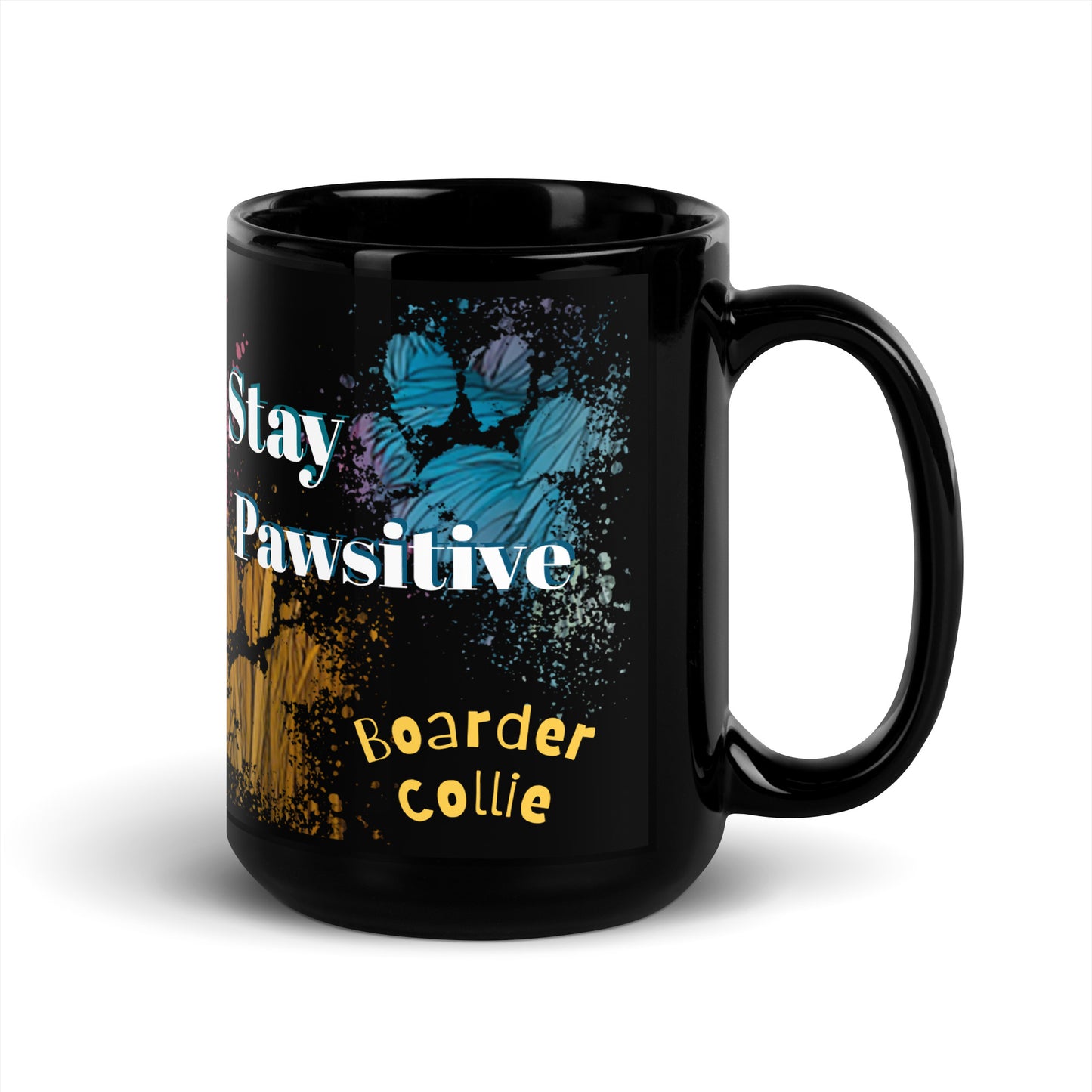Stay Pawsitive text with image of a Border Collie dog on stained glass style background with colorful  paw prints on a black ceramic mug 15 oz — handle on right