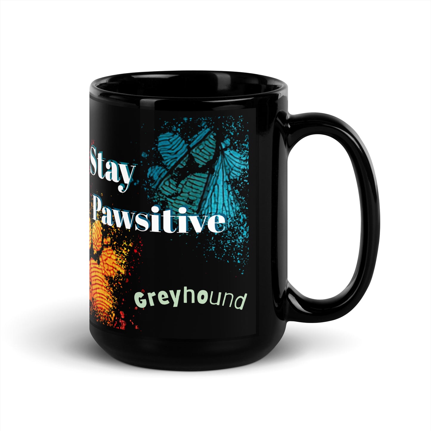 Stay Pawsitive text with image of a Greyhound dog on stained glass style background with colorful  paw prints on a black ceramic mug 15 oz — handle on right