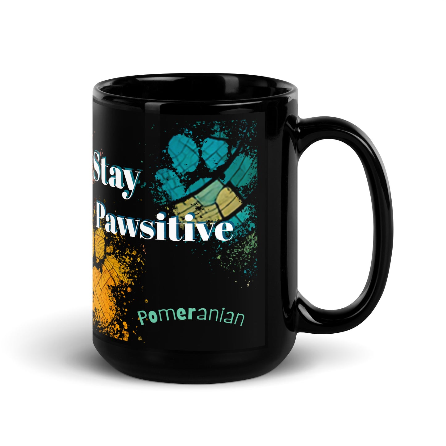 Stay Pawsitive text with image of a Pomeranian dog on stained glass style background with colorful  paw prints on a black ceramic mug 15 oz — handle on right