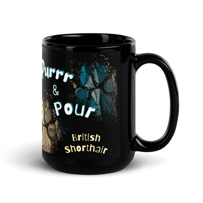 Purrr & Pour text with image of a British Shorthair cat on stained glass style background with colorful  paw prints on a black ceramic mug 15 oz — handle on right